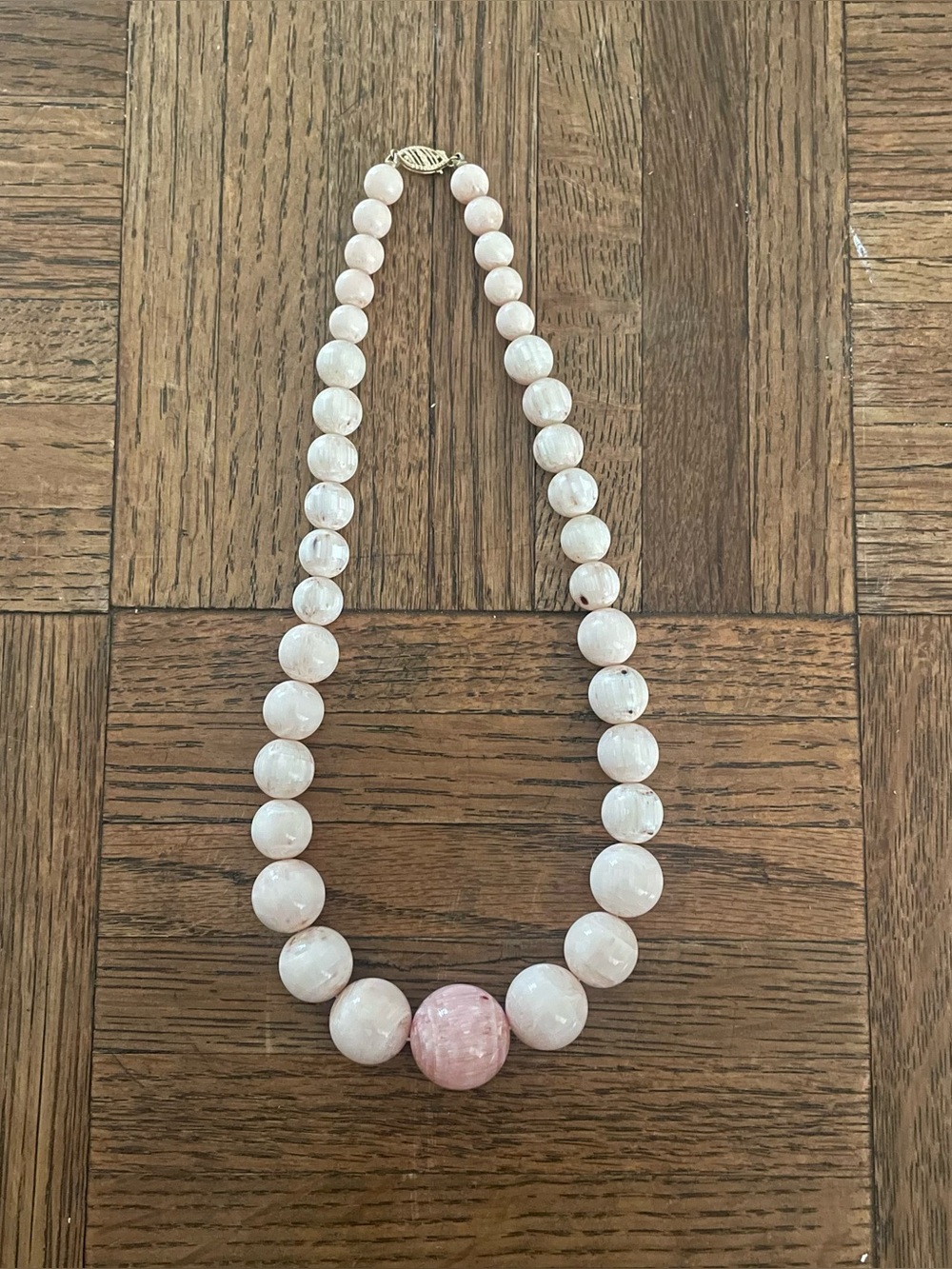 Pink stone necklace with 14k gold clasp